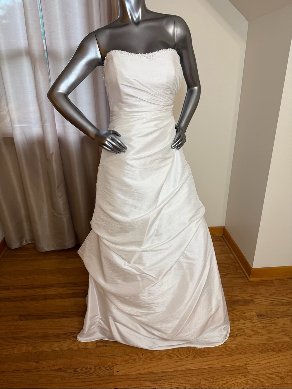 Strapless White Bridal dress with Ruched A-Line Skirt.